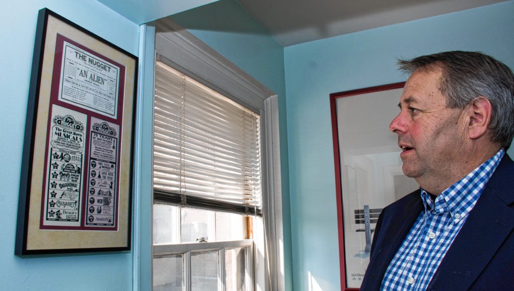 In the hallway between Hanover (N.H.) Improvement Society General Manager Jeff Graham's office and the Nugget Theatre projection room are framed pieces of the theatre's history, including some from its 75th anniversary. (Nancy Nutile-McMenemy photograph)