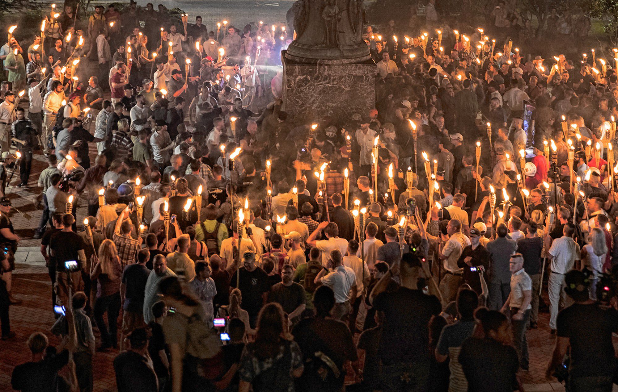 Chanting “white lives matter!” and “Jews will not replace us!” hundreds of neo-Nazis and white supremacists carried torches across the University of Virginia campus Aug. 11. MUST CREDIT: Evelyn Hockstein, The Washington Post.