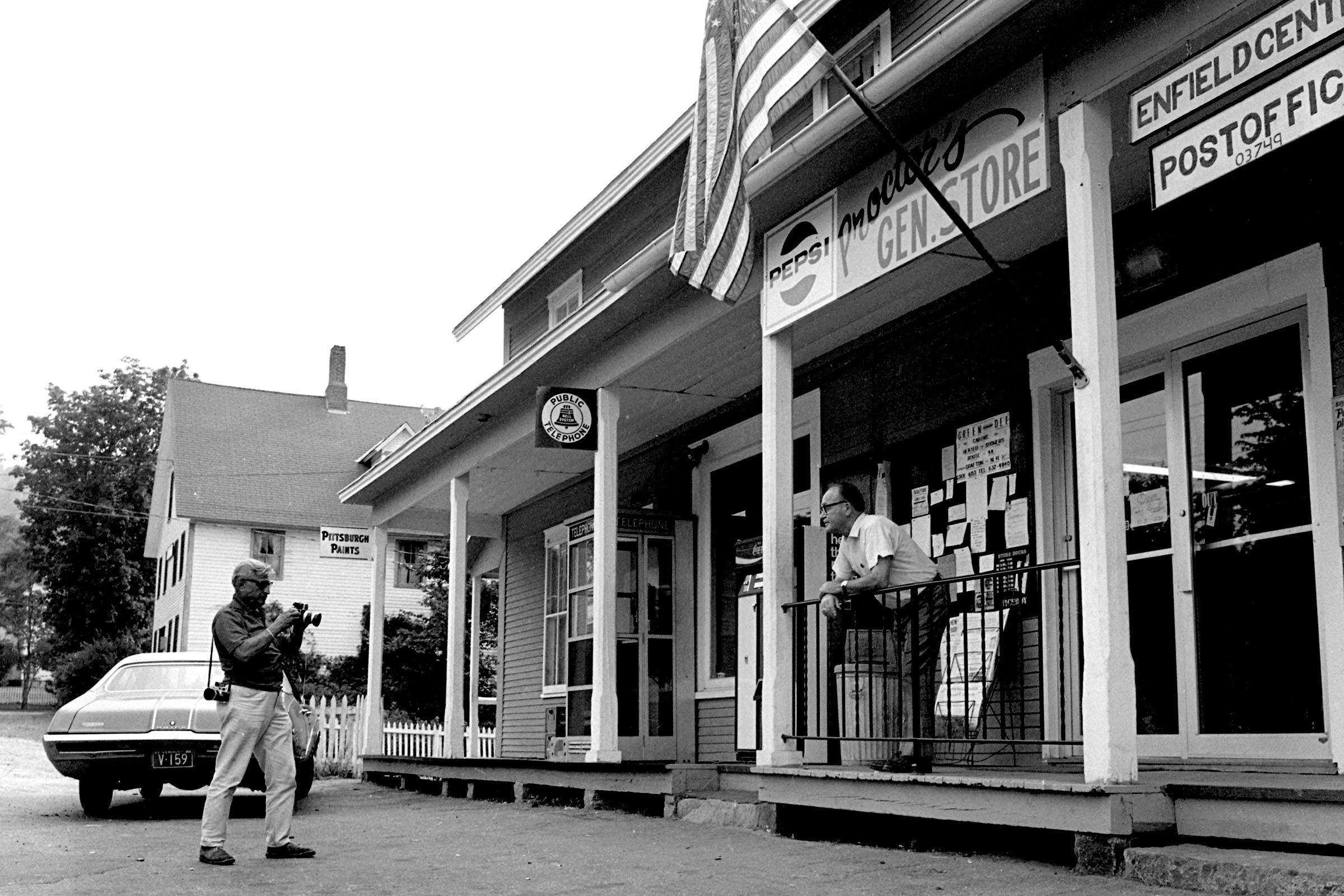 Proctor's General Store owner Warren Proctor is photographed by "The Smithsonian" magazine photographer Carl Mydans in Enfield Center, N.H., for a story about Mascoma Lake in Aug. 1972. (Valley News - Peter Selkowe) Copyright Valley News. May not be reprinted or used online without permission. Send requests to permission@vnews.com.