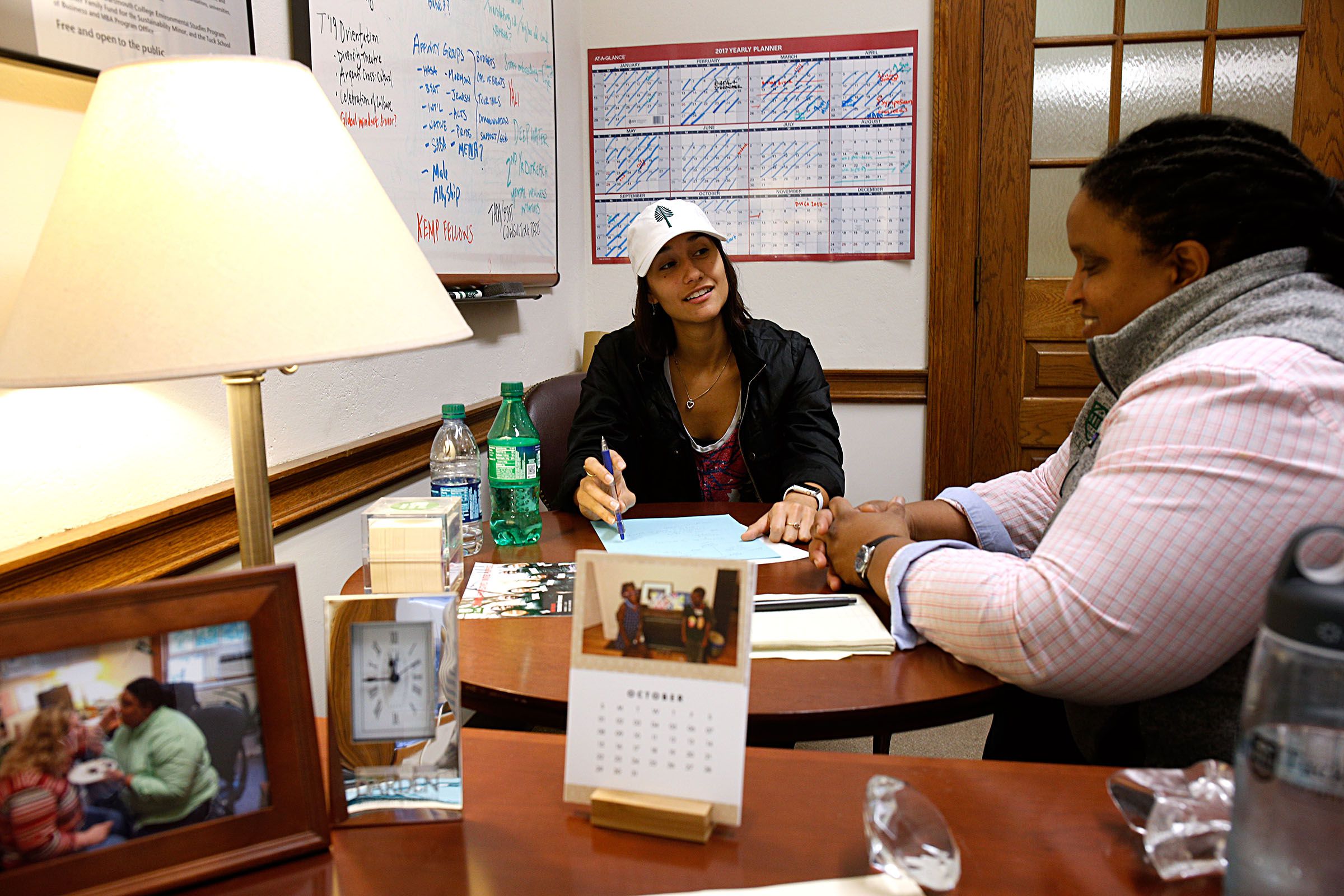 First year student Kat Hemsing speaks with Dia Draper, director of strategic initiatives at the Tuck School of Business, during a meeting in Draper's office in Hanover, N.H., on Oct. 24, 2017. Hemsing is a member of the student board and gets together with Draper monthly to talk about budgets and programs. (Valley News - Geoff Hansen) Copyright Valley News. May not be reprinted or used online without permission. Send requests to permission@vnews.com.
