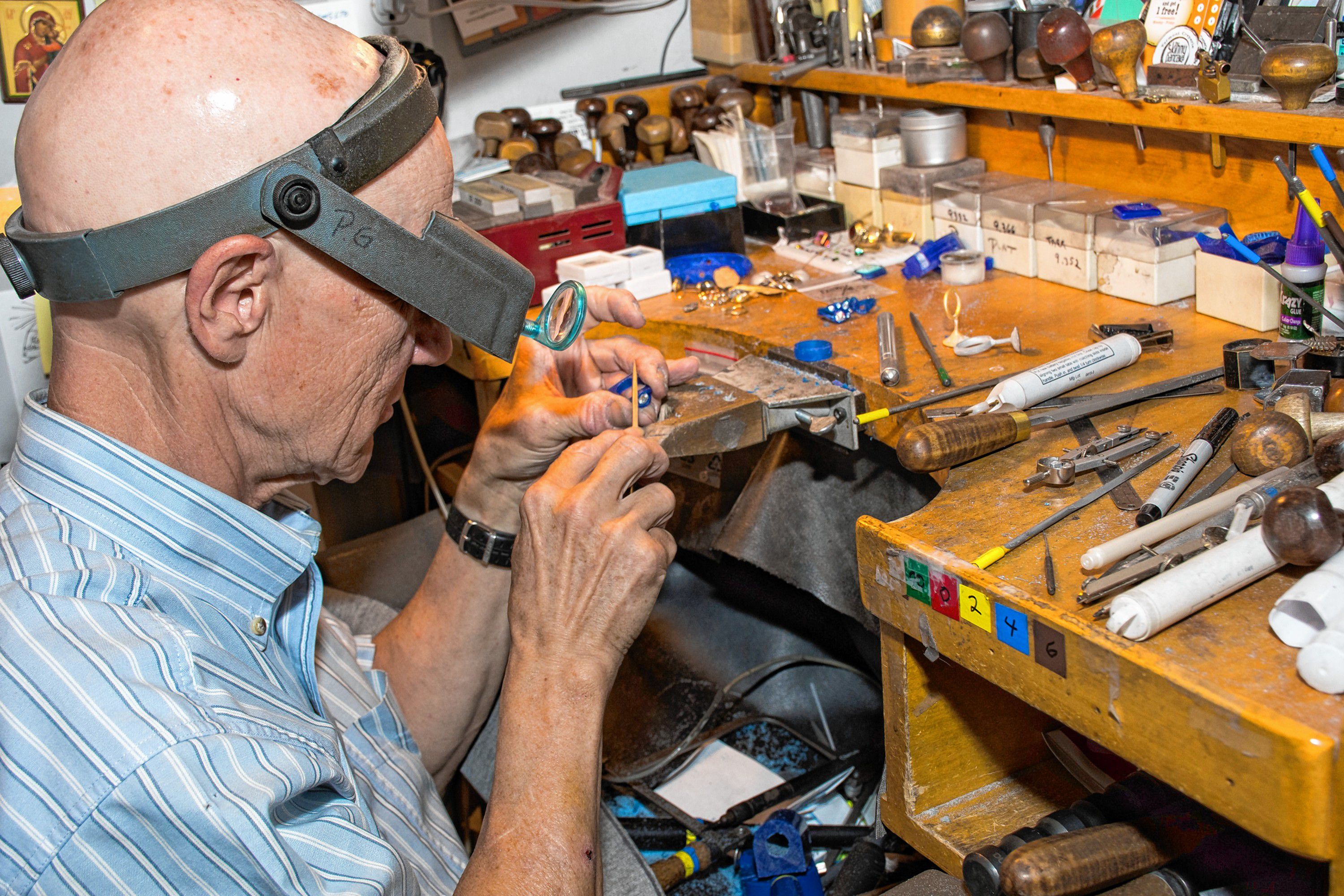 Paul Gross at his workbench at Designer Gold in Hanover, N.H. (Nancy Nutile-McMenemy photograph)