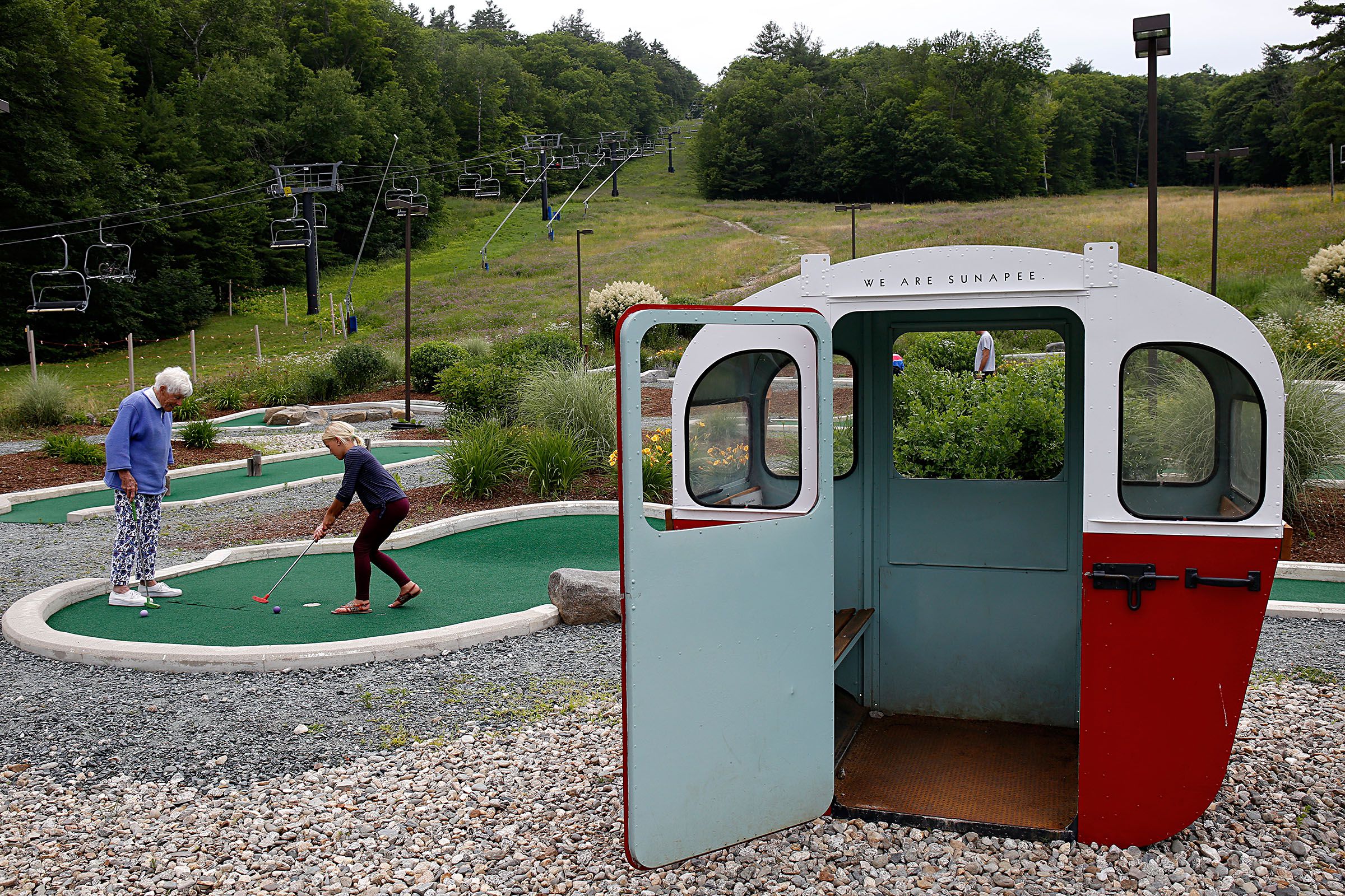 Betty Holcomb, of Newbury, N.H., watches her granddaughter Betty Holcomb, 10, of Durango, Colo., make a putt on the mini golf course at Mount Sunapee Resort's Adventure Park in Sunapee, N.H., on July 14, 2018. Betty Holcomb usually comes to visit her namesake once a year. (Valley News - Geoff Hansen) Copyright Valley News. May not be reprinted or used online without permission. Send requests to permission@vnews.com.