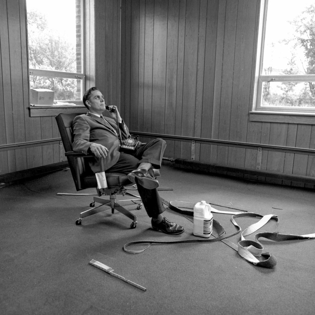 Roland Stoodley, director of New Hampshire Technical Institute in Claremont, N.H., has not fully moved into his office yet but he still takes time to answer a telephone inquiry about the school on Aug. 28, 1968. Classes at the new facility started a few days later on Sept. 3. (Valley News - Larry McDonald) Copyright Valley News. May not be reprinted or used online without permission. Send requests to permission@vnews.com.