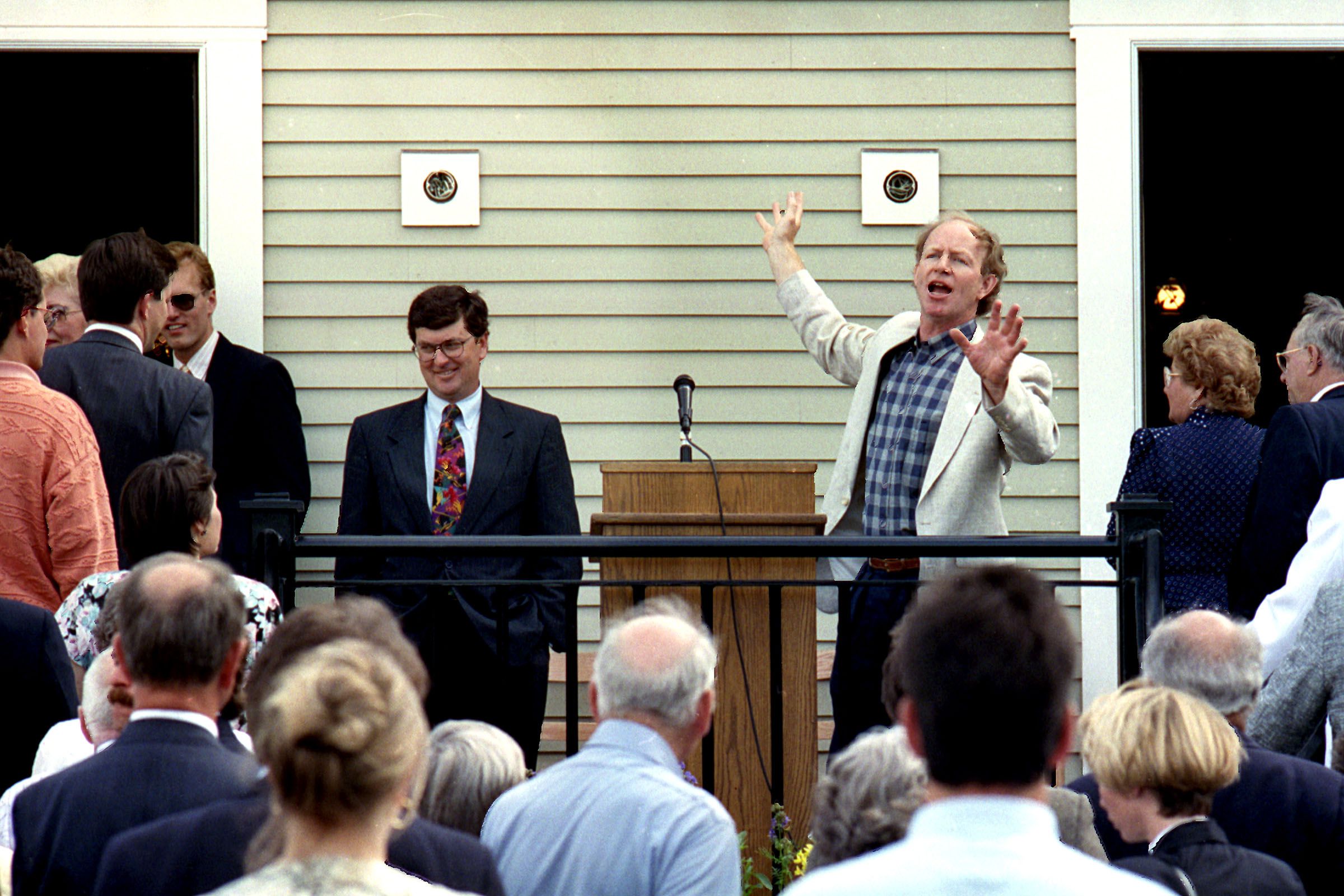 Simon Pearce talks to people gathered on June 3, 1993, for the opening of his new plant in Windsor, Vt. "The truth is," said Gov. Howard Dean at the event, "this economy isn't going to recover until the Simon Pearces of this world" begin to follow what has already been done in Windsor. (Valley News - Robert Pope) Copyright Valley News. May not be reprinted or used online without permission. Send requests to permission@vnews.com.