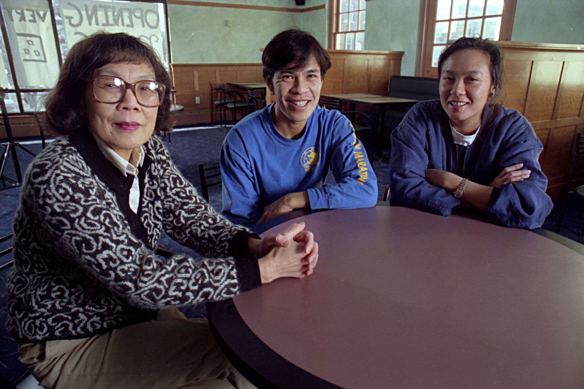 Photographed on Feb. 6, 1994, Cynthia Ou, left, opened a restaurant in Hanover, N.H., with help from two of her children, Eddy and Emily Ou. Ou had been running a Chinese restaurant in the Dartmouth Medical School cafeteria for over two decades, serving over a million lunches. (Valley News - Geoff Hansen) Copyright Valley News. May not be reprinted or used online without permission. Send requests to permission@vnews.com.