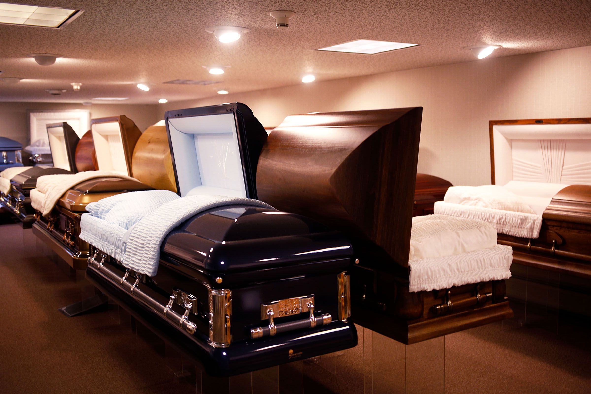 Stringer Funeral Home houses a showroom for casket options in Claremont, N.H., on Tuesday, April 9, 2019. Owner Mike Stringer says not many funeral homes have caskets on display anymore, due to the majority of people now choosing cremation. (Valley News - Joseph Ressler) Copyright Valley News. May not be reprinted or used online without permission. Send requests to permission@vnews.com.