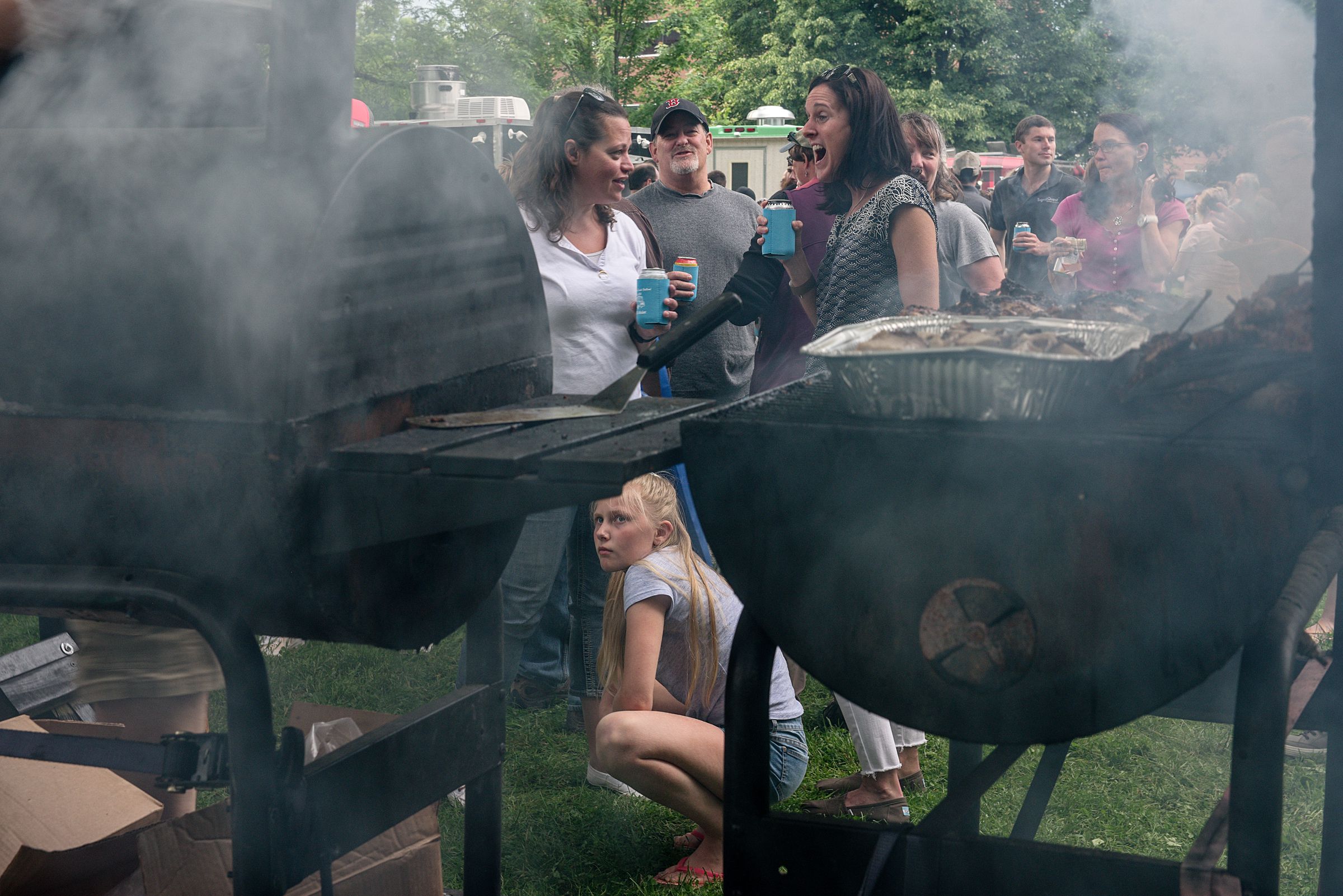 Customers wait in line at Boogalow's Island BBQ during the Lebanon (N.H.) Food Truck Festival in Colburn Park, Friday, June 21, 2019. (Valley News - James M. Patterson) Copyright Valley News. May not be reprinted or used online without permission. Send requests to permission@vnews.com.