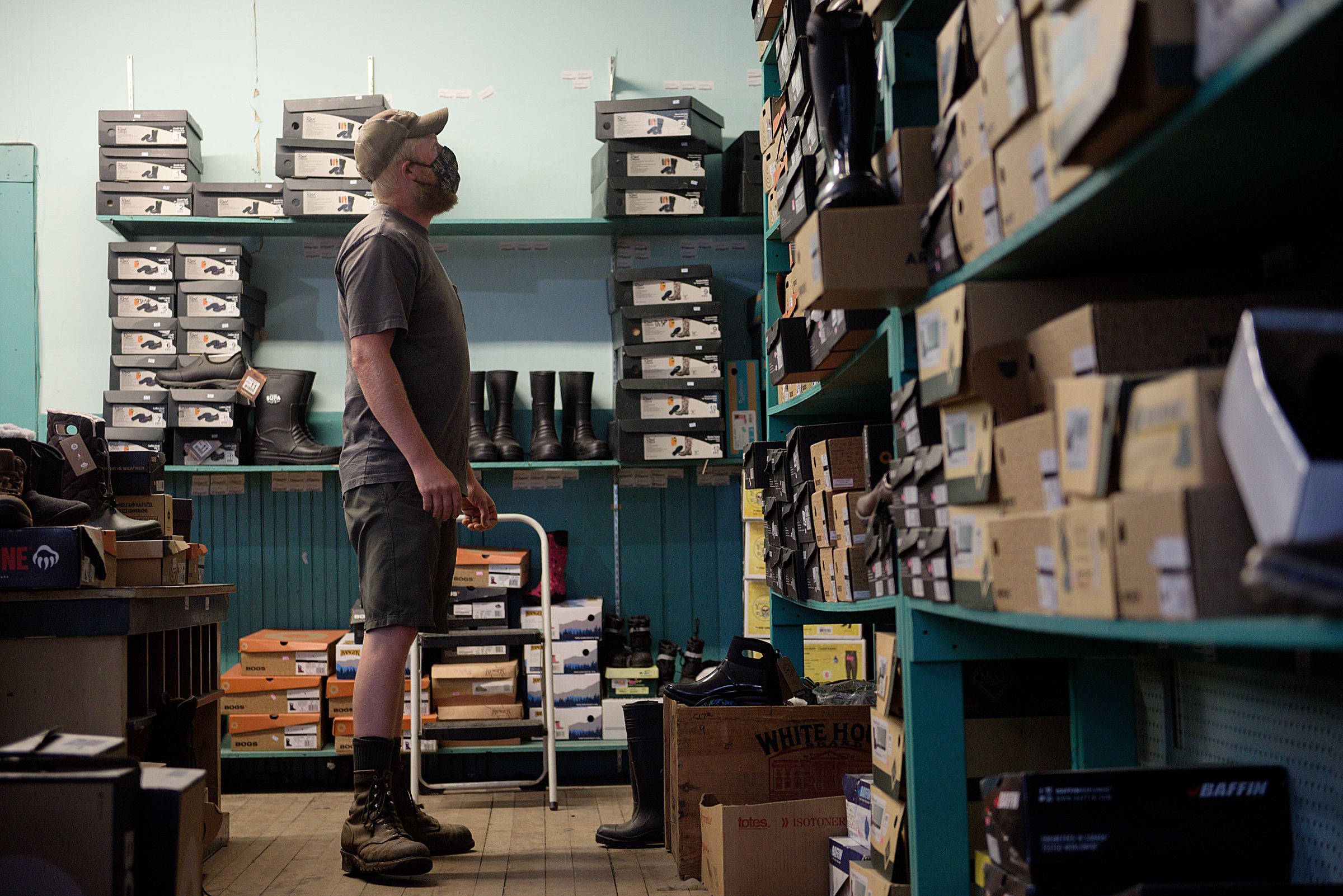 After blowing out his work boot the night before, Josh Swift, of Norwich, was waiting in his truck for Dan and Whit’s in Norwich, Vt., to open Thursday, July 10, 2020 so he could look for a replacement pair. (Valley News - James M. Patterson) Copyright Valley News. May not be reprinted or used online without permission. Send requests to permission@vnews.com.