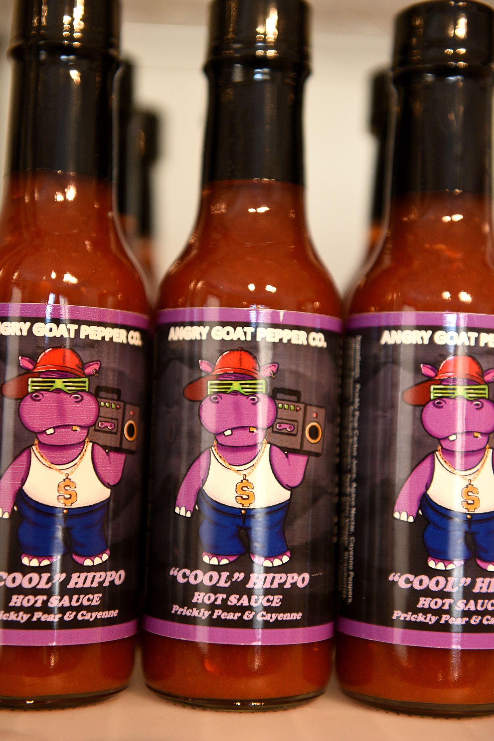 Cool Hippo Hot Sauce, with prickly pear and cayenne, is one of the many products made by Angry Goat Pepper Co. for sale in their retail store in White River Junction, Vt., on Thursday, Jan. 8, 2020. ( Valley News - Jennifer Hauck) Copyright Valley News. May not be reprinted or used online without permission. Send requests to permission@vnews.com.