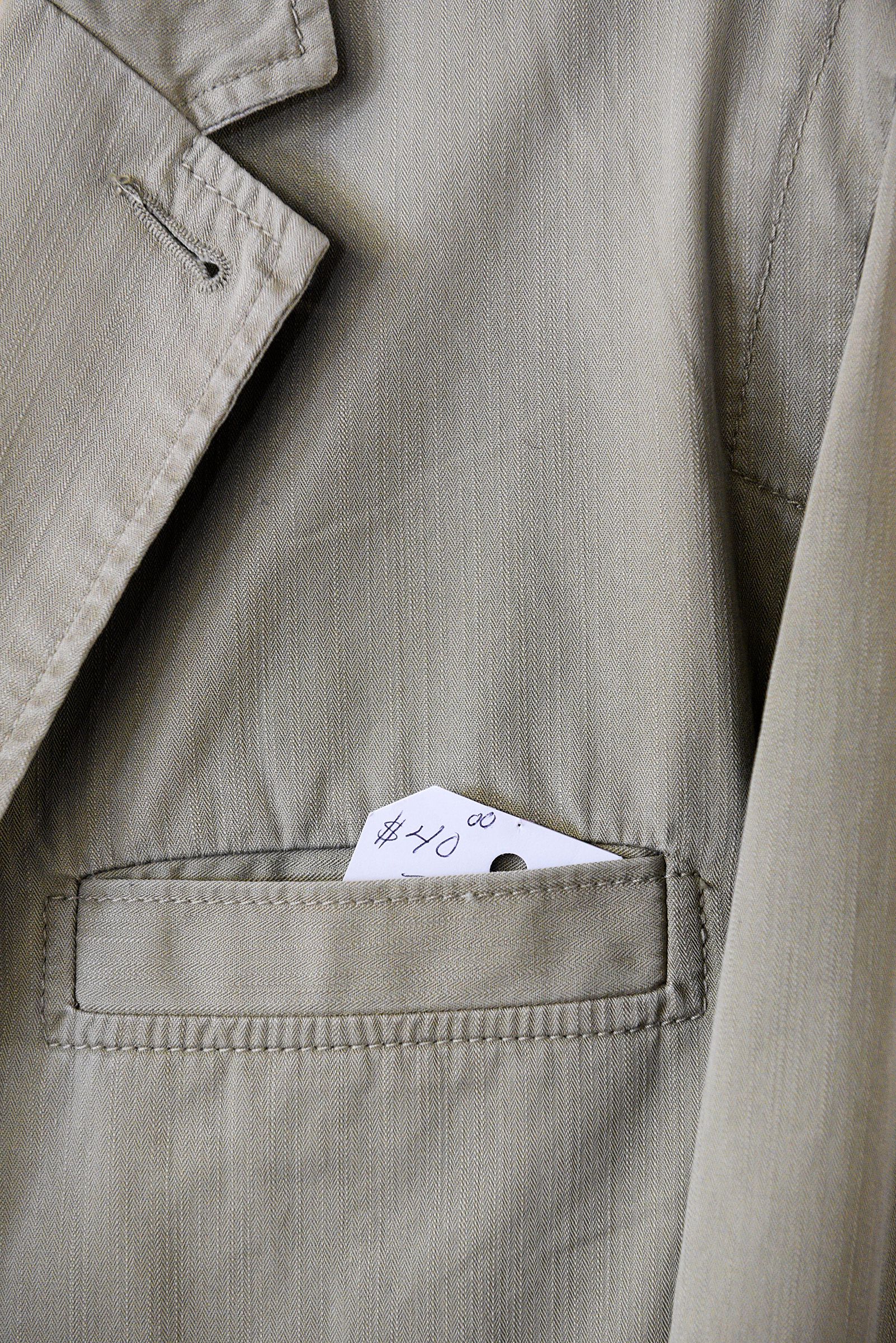 A consigned jacket waits for its next owner on the top floor of Consign and Design in West Lebanon, N.H., Friday, March 26, 2021.(Valley News - James M. Patterson) Copyright Valley News. May not be reprinted or used online without permission. Send requests to permission@vnews.com.