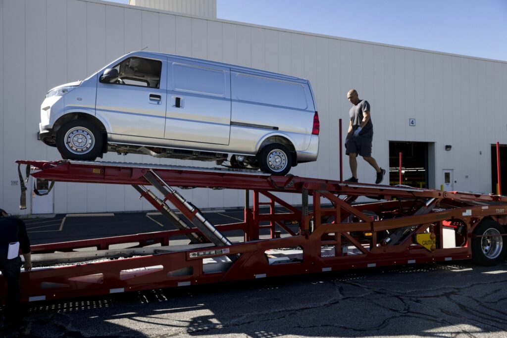 An Urban Delivery electric van is loaded onto a truck outside the Electric Last Mile Solutions facility in Mishawaka, Indiana, on Sept. 28, 2021. MUST CREDIT: Bloomberg photo by Taylor Glasscock.