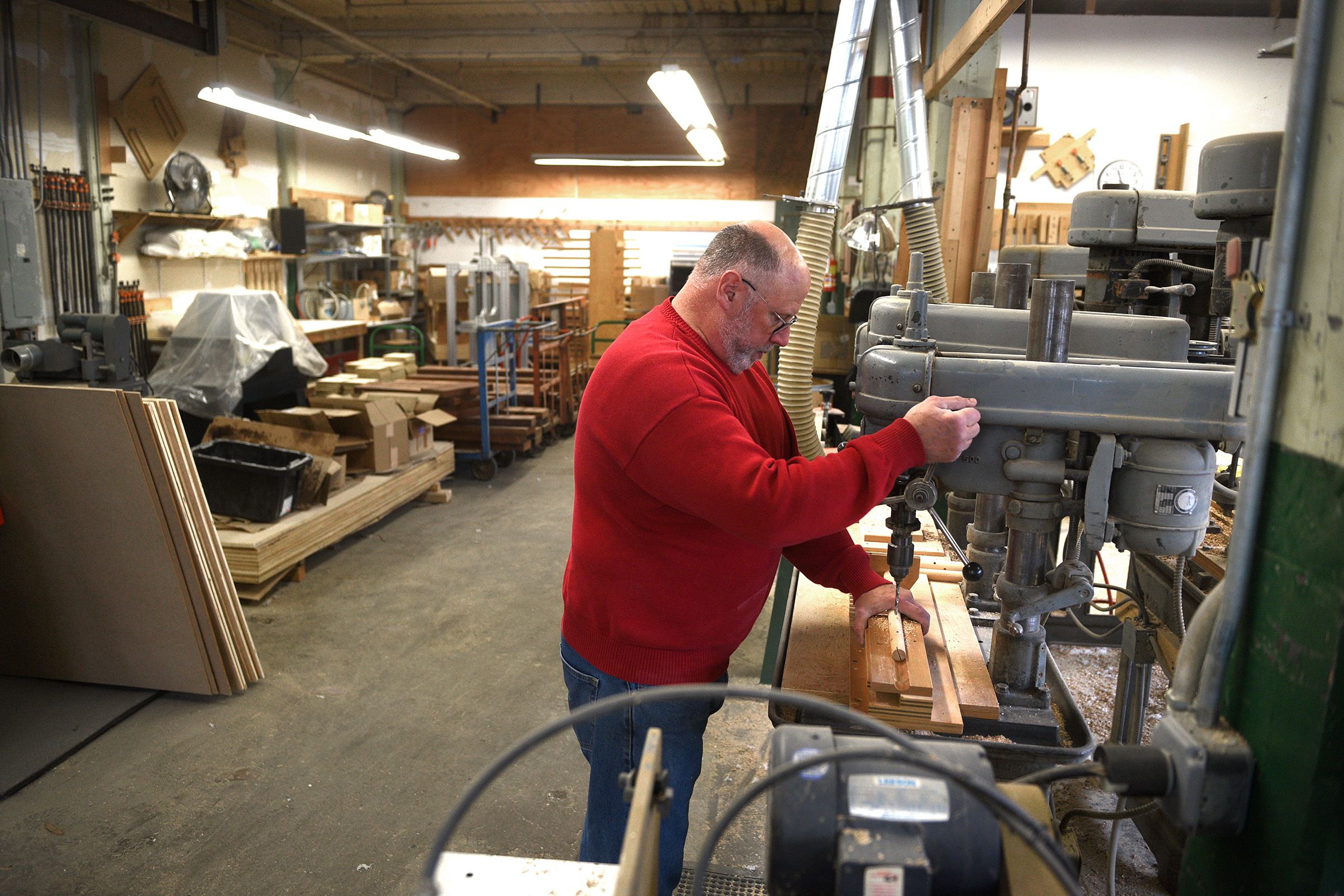 Andy Charron, who started his business in 1993 in a one-car garage in New Jersey, works in his shop in the former Goodyear manufacturing complex in Windsor, Vt., on Jan. 5, 2022. Charron Wood Products makes wooden component parts for other businesses. (Valley News - Jennifer Hauck) Copyright Valley News. May not be reprinted or used online without permission. Send requests to permission@vnews.com.
