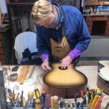 A guitar-maker passes on his craft