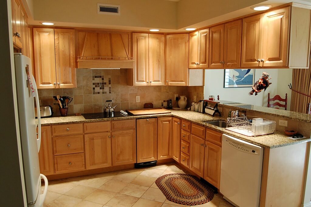 Before Susan and Alan DiStasio's 2021 kitchen remodel at their Hanover, N.H., home, the room had a dining space separated by a countertop and hanging cabinets. Photo courtesy of Alan DiStasio